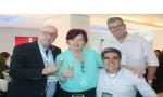 Elza Wolcoff, brinda com os expositores, Roberto Bocovis (It Thermas), Cesar Peicho (Rafain Palace Hotel) e Dimas Frana (Grupo Leceres),